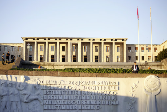 image Car set ablaze outside Turkish parliament before meeting on PKK disarmament